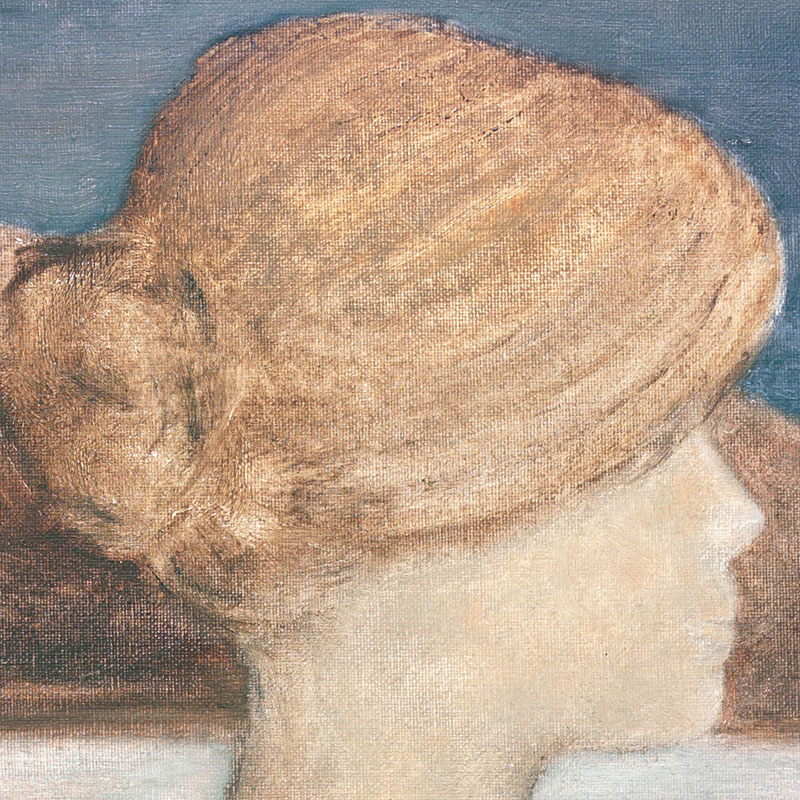 Donna seduta di profilo